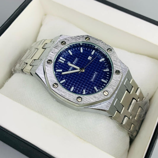 Luxury watch with blue dial and silver metal bracelet in a box