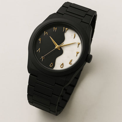 Black watch with white face on a light gray background, featuring 'Luxury That Speaks Arabic' text.